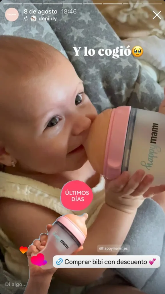 bebé tomando leche en un biberón happymami